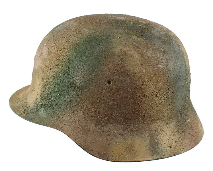 Spanish German style M1935 helmet: E-121 Spanish, German style M35 with an unrolled edge. Applied Normandy pattern tan/green/rust camouflage sand finish. Wide leather sweatband with applied leather/cloth liner and double web (one is sp