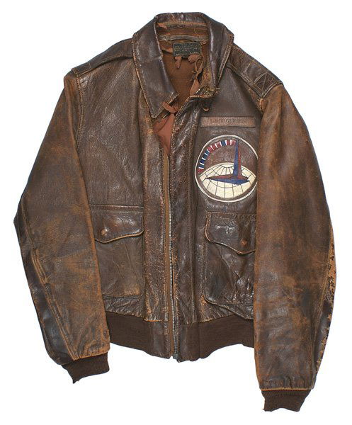 U.S. WWII Air Transport A-2 jacket: F-73 U.S. WWII Air Transport Command A-2 leather jacket. Two flap pockets. Several "bites" out of the top of one of the zpper borders. 5" diameter leather unit patch on left chest (obelisk/top of glob