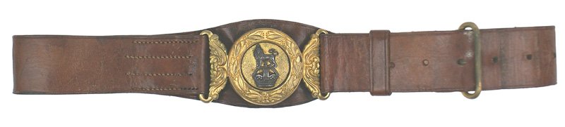 British WWI officer brown leather belt: F-117 British WWI officer's brown leather belt. Age-toned silver lion/crown on center of two-piece gilt buckle. Stamped with name of maker on reverse. II