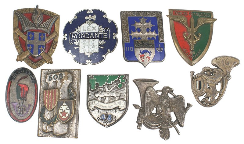 Lot of 9 French regimental badges