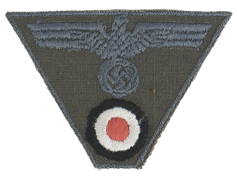 U.S. GI Burris lot Panzer EM trapezoid insignia: S-29 The following item is from the estate of Navy Petty Officer A.W. Burris who served in the South Pacific on the USS Massachusetts in 1944. Panzer EM bevo embroidered eagle/rosette, black trapezoid