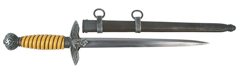 German WWII Luftwaffe 2nd Model dagger: D-24 German WWII Luftwaffe 2nd model officer's dagger - with a deep orange grip. Clean blade with "Alcoso Solingen" logo. About excellent except for several small dark spots near tip. Scabbard has a n