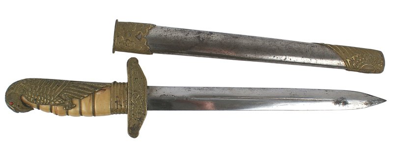Chinese WWII Air Force officer dagger: D-47 Chinese WWII Air Force officer's dagger. Gilt brass well-defined eagle, with a red glass eye, shaped back strap/pommel. Wire wrapped age-toned yellowed celluloid grip (chipped). Gilt eagle crossg