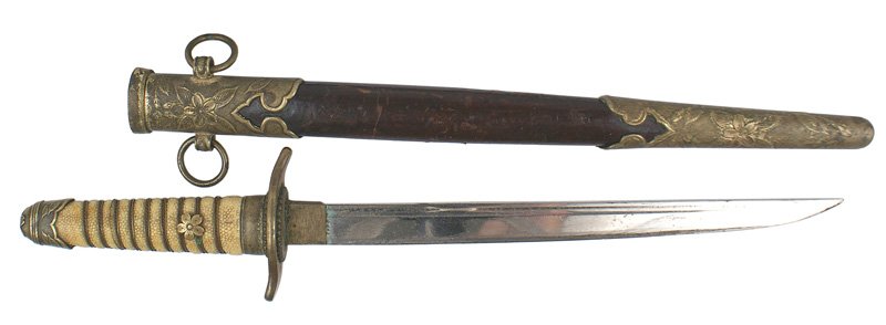 Japanese WWII Navy dress dagger: D-55 Japanese WWII Navy dress dagger. Wire wrapped white sharkskin grip. Mum decorated pommel cap, handle fittings, and a short brass crossguard. 8 1/4" clean blade with a fuller near the spine. Has b