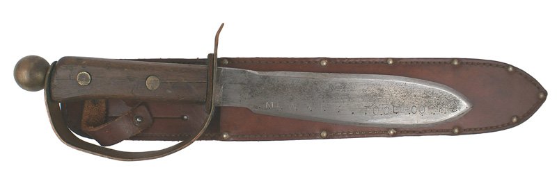 Large U.S. WWII bowie fighting knife: D-63 Large U.S. WWII bowie type fighting knife. Wood grips with a brass ball top pommel and a 1" wide thick copper reverse "D" knuckle-bow. Heavy 8 5/8" blade is similar in shape to the 1917 Bolo. Sta