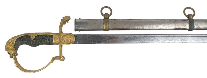Imperial German Artillery officer dress sword: D-83 Imperial German artillery officer's dress sword. Finely chiseled gilt lion-head pommel (with red stone eyes)/relief floral back strap. Gilt reverse "P" knuckle-bow/crossguard with a detailed lion
