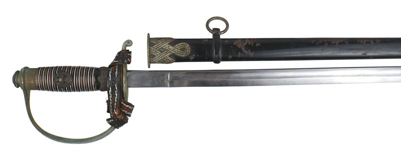 German WWII Police officer dress sword: D-97 German WWII Police officer's dress sword. Nickeled pommel and reverse "D" knuckle-bow. (Darkened from age and moisture with light patches of verdigris.) Wire wrapped ribbed polished wood grip wit