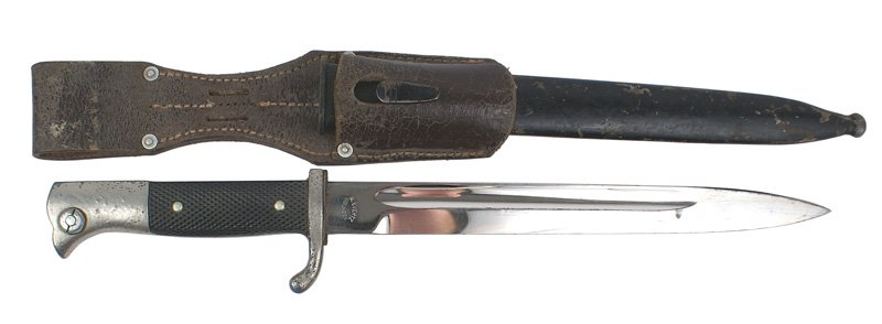 German WWII Army parade dress bayonet: D-126 German WWII Army parade dress bayonet - 9 7/8" clean blade marked "A. EVRETZ - SOLINGEN". Leather spacer. Some small "bubbling" to finish on pommel and crossguard. Red felt insert in pommel. Fin