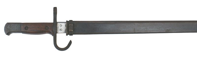 Japanese Arisaka M1897 bayonet: D-136 Japanese Arisaka M1897 bayonet. Most of the dark bluing is intact on the fittings, crossguard and scabbard. Clean steel blade would rate about excellent - only several minute spots towards tip. 