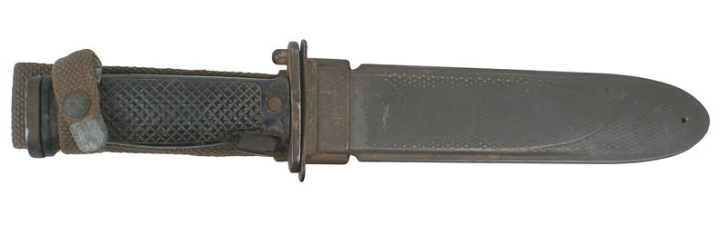 U.S. M5 bayonet: D-152 U.S. M5 bayonet. Checkered black plastic grips with a release bar. Hilt marked "US M5-1" and "J + D TOOL Co.". 70% finish on the 6 5/8" blade. Fiber scabbard with a metal throat marked "USN MK-2