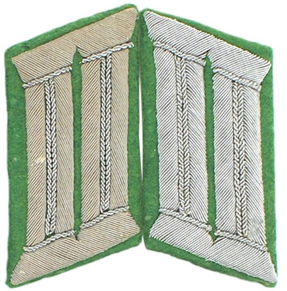 German WWII Panzer Grenadier collar tabs: H-67 Panzer Grenadier parade dresscollar tabs. Dull silver-gray litzen on light green. Mismatched pair. One is age toned. About II