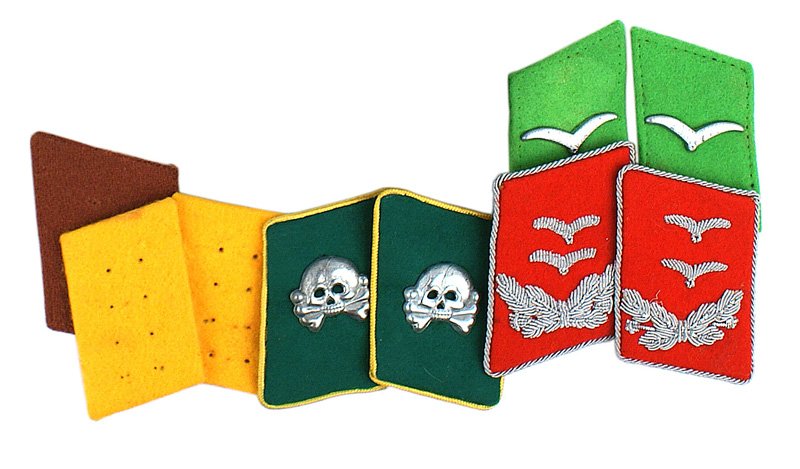 Lot of German WWII Luftwaffe collar tabs: H-77 Lot of Luftwaffe collar tabs: (1) Flak Oberleutnant. Silver bullion on red. Pair. (2) EM Traffic Controller (lime green). Pair. (3) Recon with skulls. Green with skulls. Green with yellow - gold 