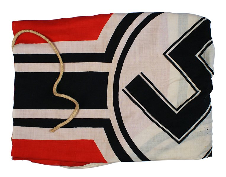 German WWII Navy Kriegsflagge flag: H-178 Navy "Kriegsflagge". Black swastika within a white circle with white and black stripe dissected panels - all on a red field. Black Iron Cross in upper left corner. Several holes. Sleeve is marke
