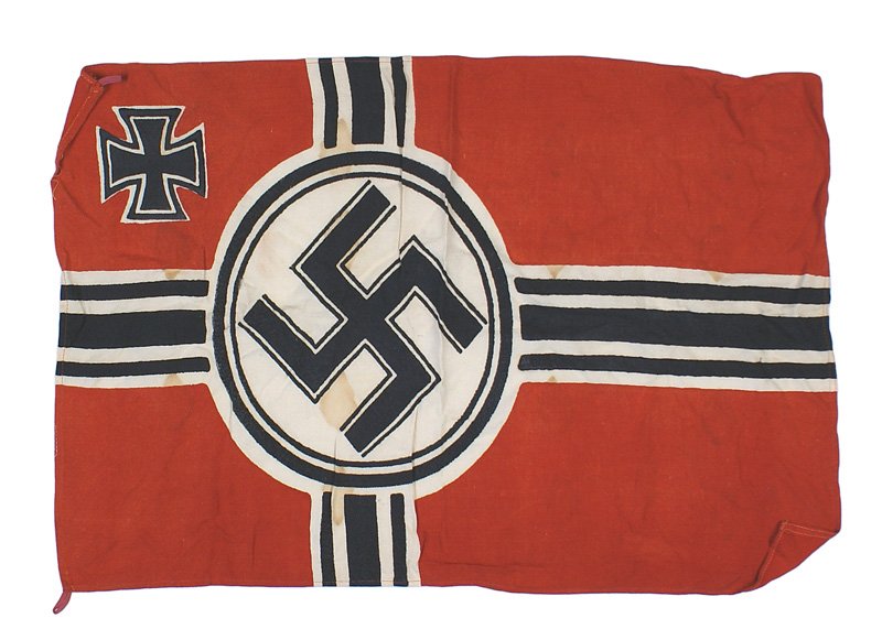German WWII Navy Kriegsflagge flag: H-179 Navy "Kriegsflagge". Black swastika within a white circle with white and black stripe dissected panels - all on a red field. Black Iron Cross in upper left corner - small size. 16"x24". Several 