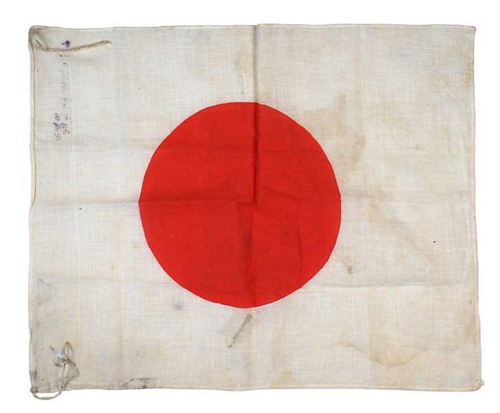 Japanese WWII soldier's cotton flag: H-238 Japanese soldier's cotton flag. Red printed "meatball" on a white field. "Kanji" in corner. String ties. 12" x 15". This type flag was tied to a rifle with a fixed bayonet. II