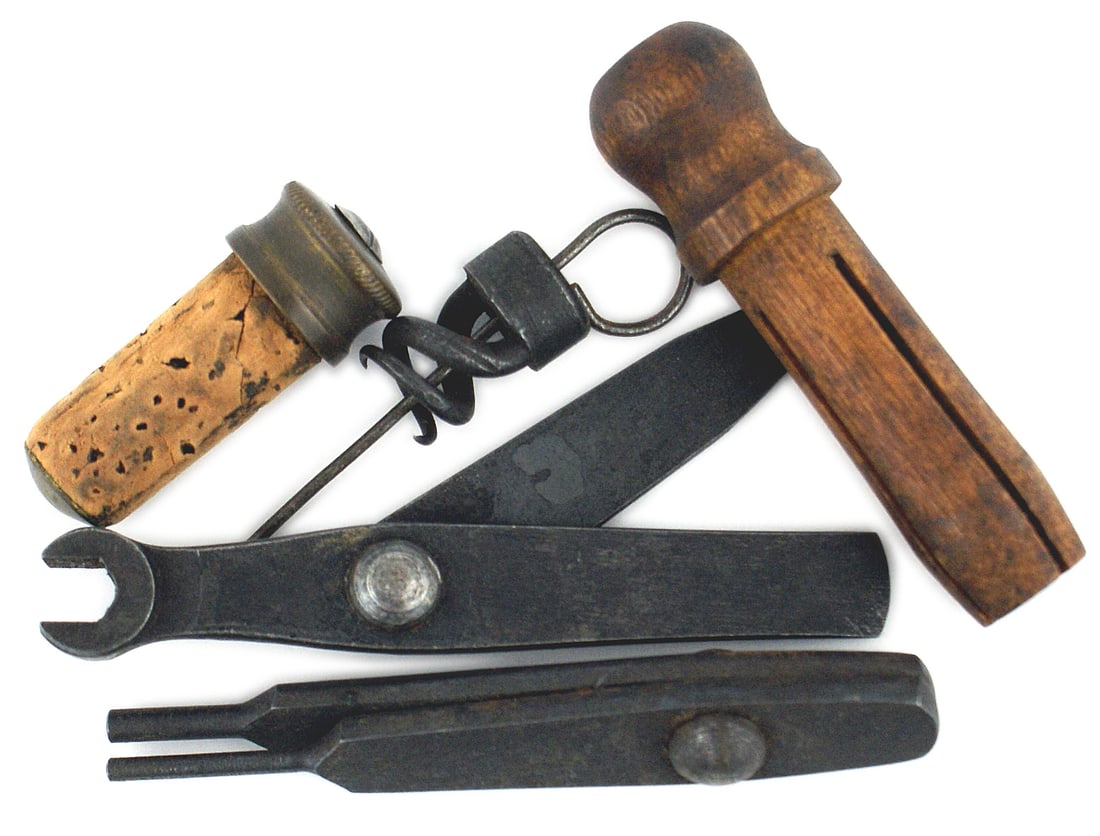 Civil War rifle lot wrench worm etc: K-057 Miscellaneous Civil War lot: (1) Rifle wrench with two screwdriver blades. Both held together with a domed rivet. (2) Two size punch, one on each blade. (3) Gun worm for extracting a lead shot f