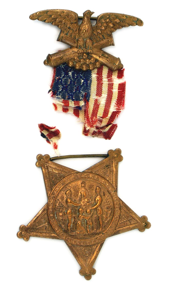 Civil War GAR Badge Type IV 1868: K-084 U.S. Grand Army of the Republic (GAR) Badge, Type IV - 1868. Five pointed bronze star with a center scene of the Goddess of Liberty, a soldier and sailor, flags, etc. Reverse has the National sh