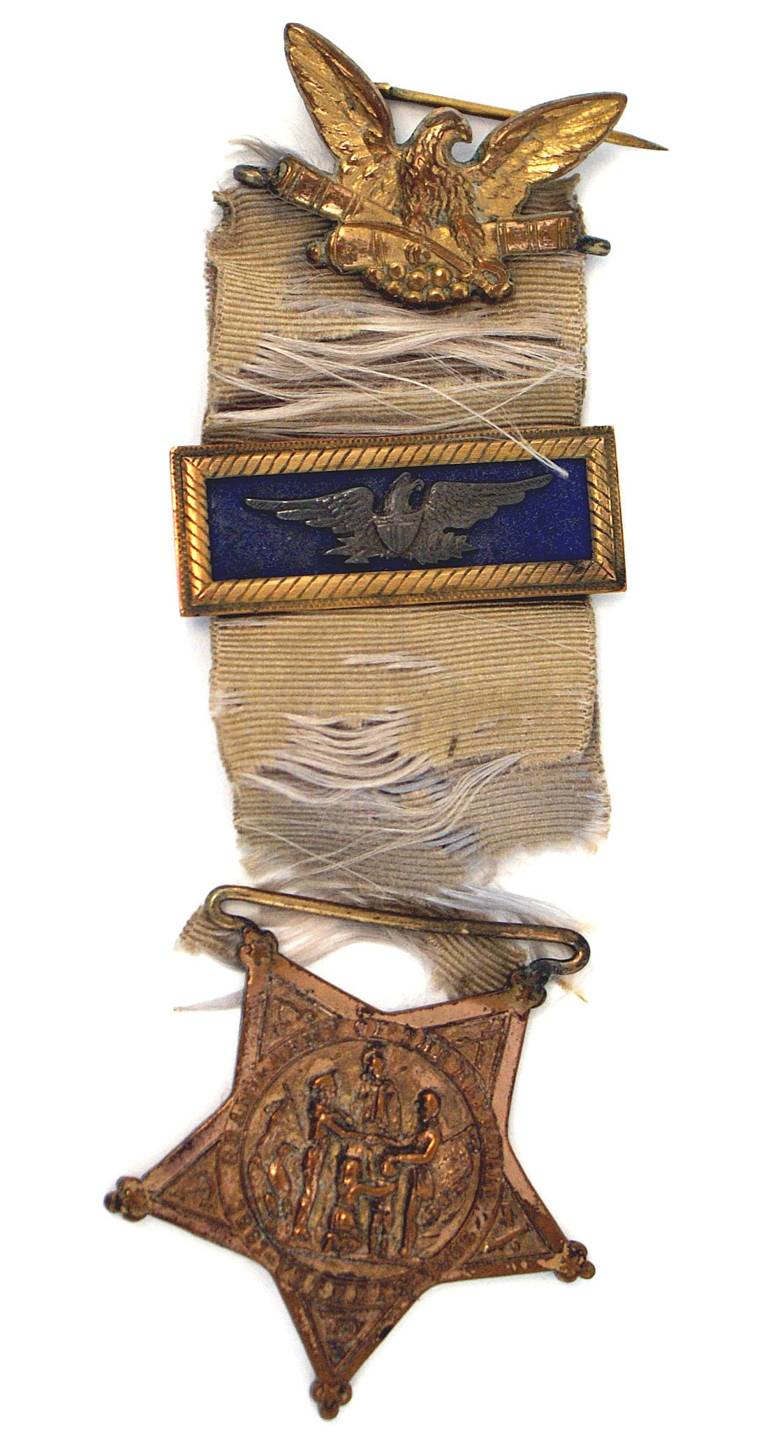 Civil War GAR Badge Past Post Officer TYPE III 1869: K-086 U.S. Grand Army of the Republic (GAR) Badge for a Past Post Officer. TYPE III - 1869-1876. Five pointed bronze star with a center scene of the Goddess of Liberty, a soldier and sailor, flags, et