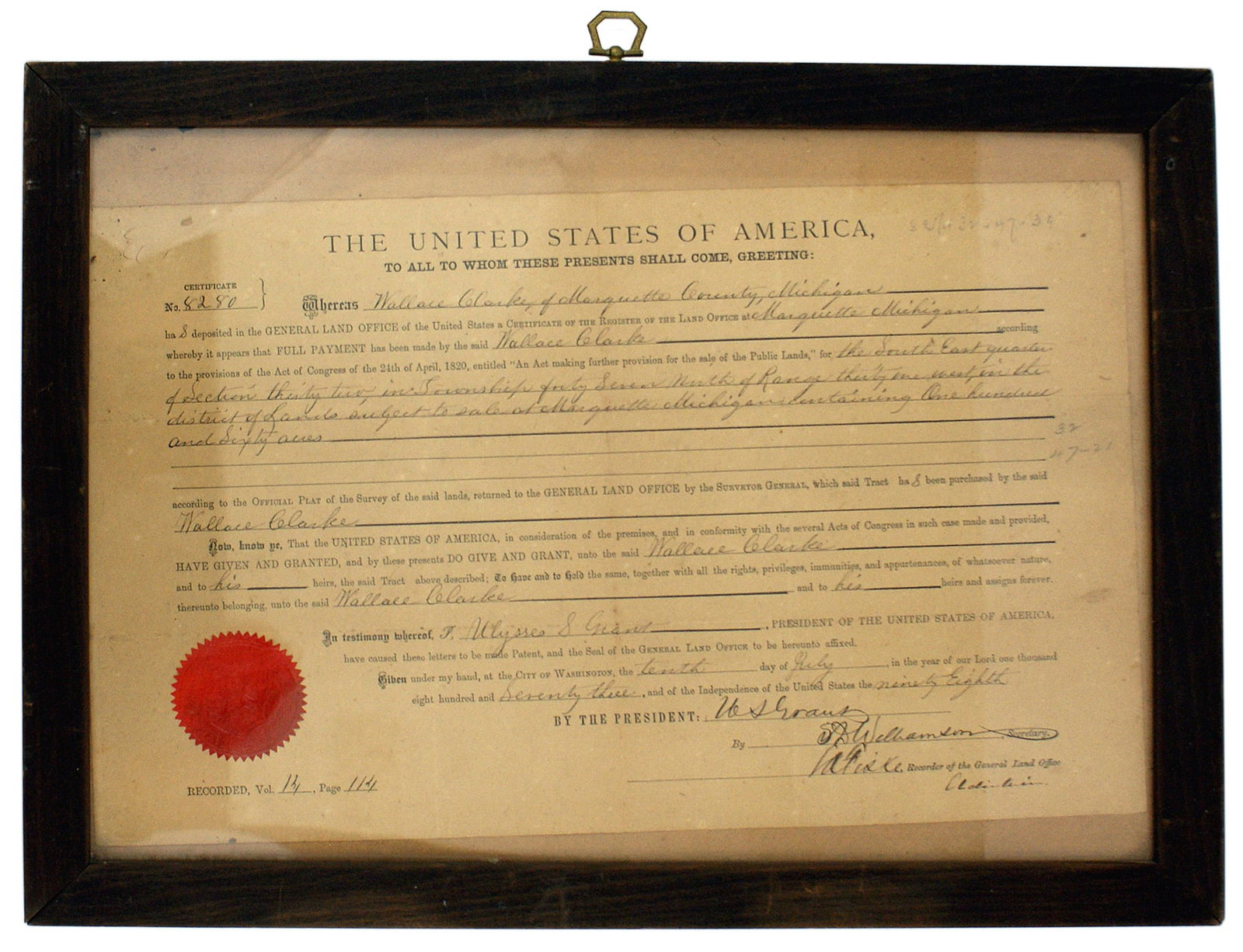 Post Civil War 1873 land grant: K-100 Title granting the sale of one-hundred and sixty acres of federal land in Marquette, Michigan to Wallace Clarke. Dated July 10, 1873, with official seal and signature of President Ulysses Grant.