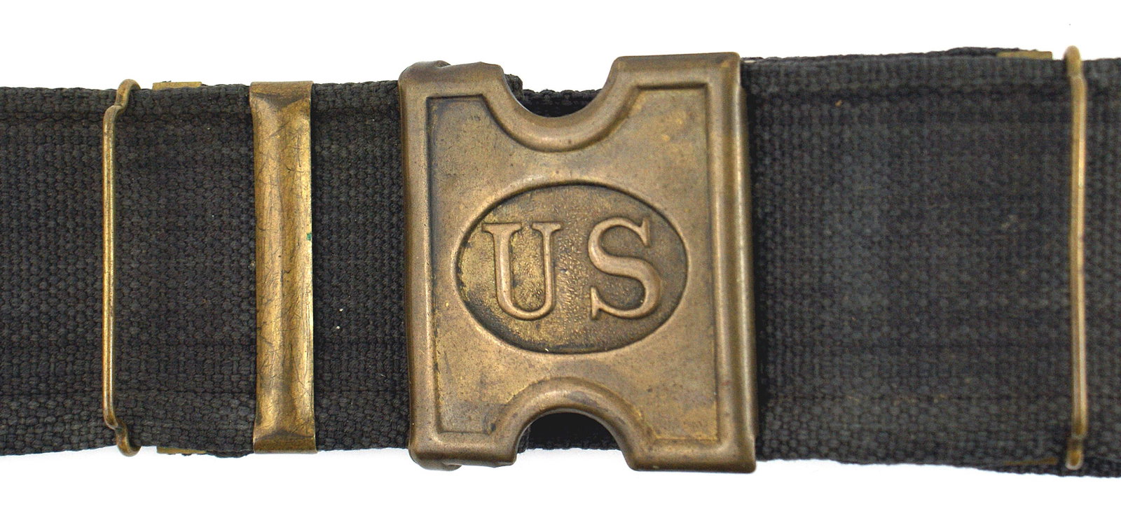 US Navy SpanAm War 45-70cartridge belt: K-116 U.S. Navy Spanish American War 45-70 blue web cartridge belt. Reverse in white paint "USN" over "3 - 01". Large Mills brass "US" buckle. Loops for 45 cartridges. One loop is partially torn. Othe