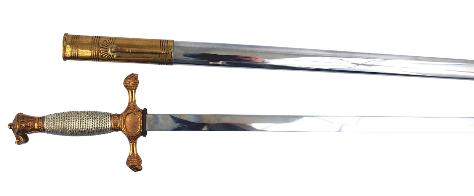 Army cadet sword circa 1950s-2000: K-118 Army cadet sword. Basically a West Point sword with a gilt eagle on obverse and reverse of pommel. Cast white metal grip. Straight gilt crossguard with eagle head finials. Oval blank depression 