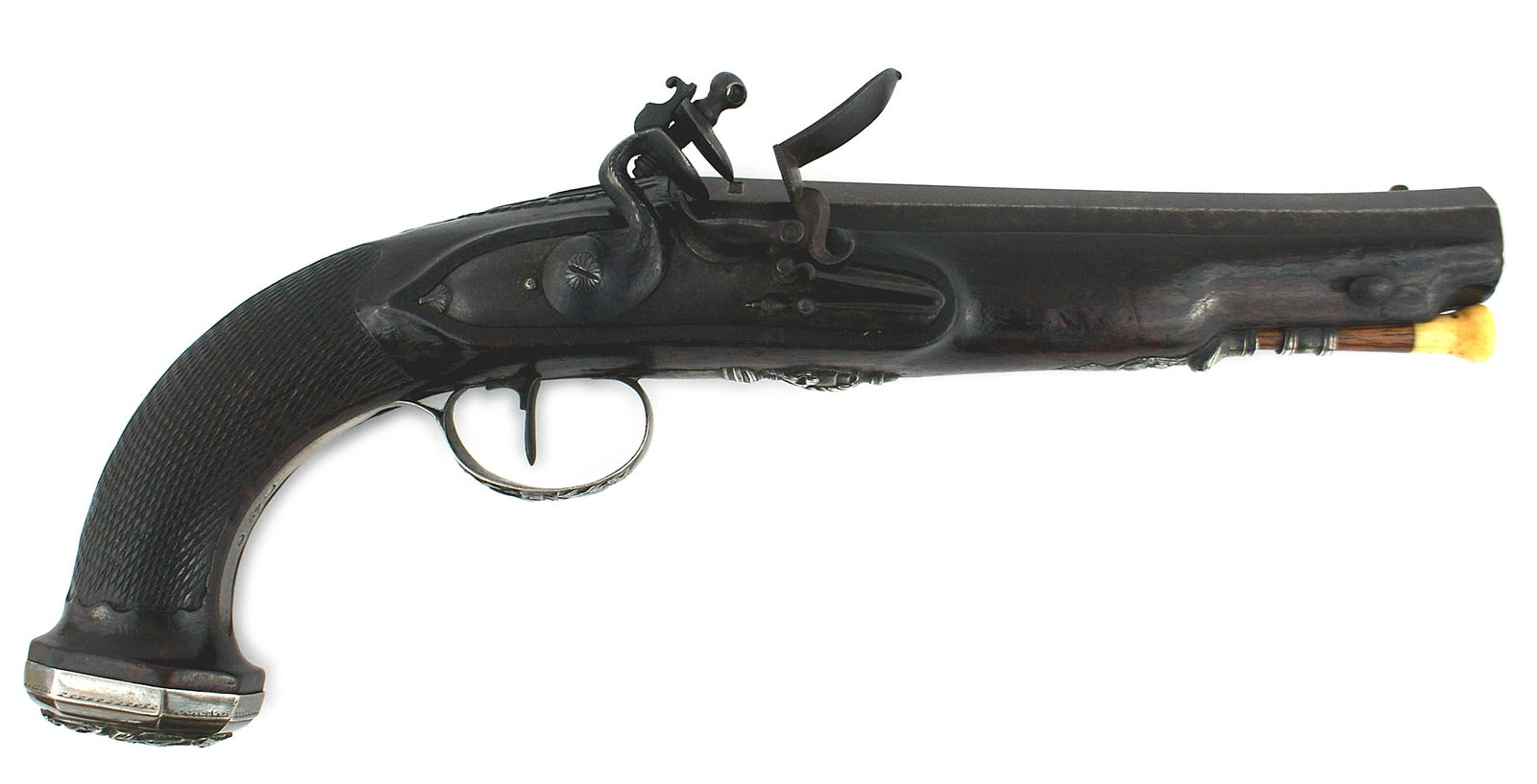 Silver mounted French flintlock pistol: M-002 A quality silver mounted French flintlock pistol. Darkened wood stock adds to highlight of the silver side plate bearing a lion/flags/armor and a cannon, trigger guard of relief silver work, a f