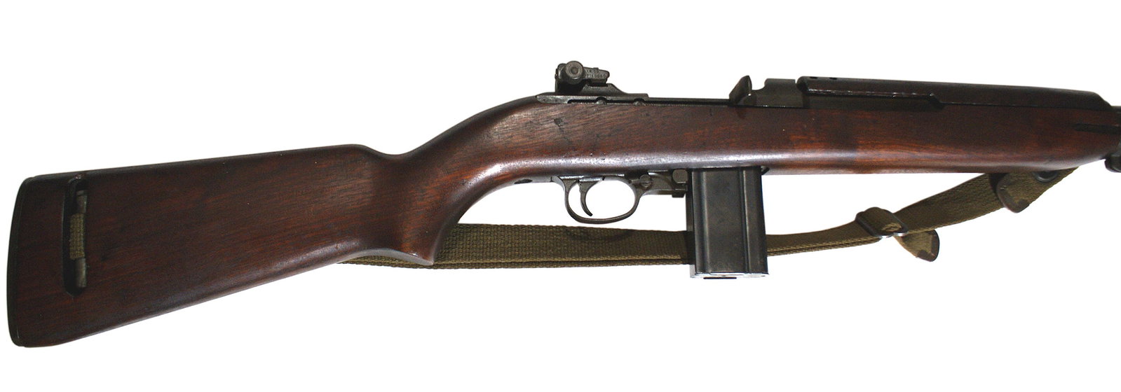 Inland Division M1 Carbine rifle: M-019 Inland Division M1 Carbine 30 Cal. SN#3036476. Marked U.S. Carbine, Cal. 30 M1. Has an Underwood barrel. 15 round magazine. Has bayonet lug. The wood is in very good condition. Parkerizing is in