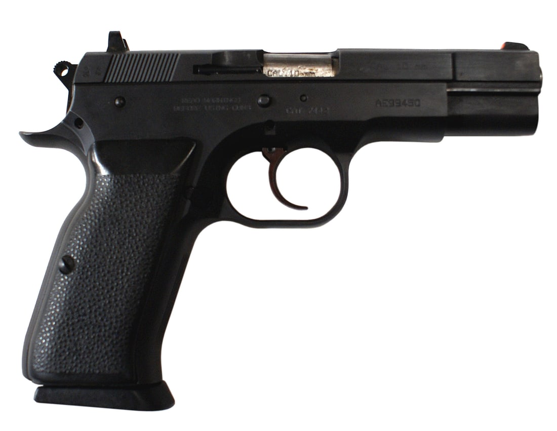 EAA Tanfoglio Witness 10mm pistol: M-045 EAA Tanfoglio Witness 10mm. SN#AE99450. Overall condition is good. Bore is bright. Front and rear sights have been painted orange. The left side of the firearm is marked "Witness EAA-Cocoa-FLA"