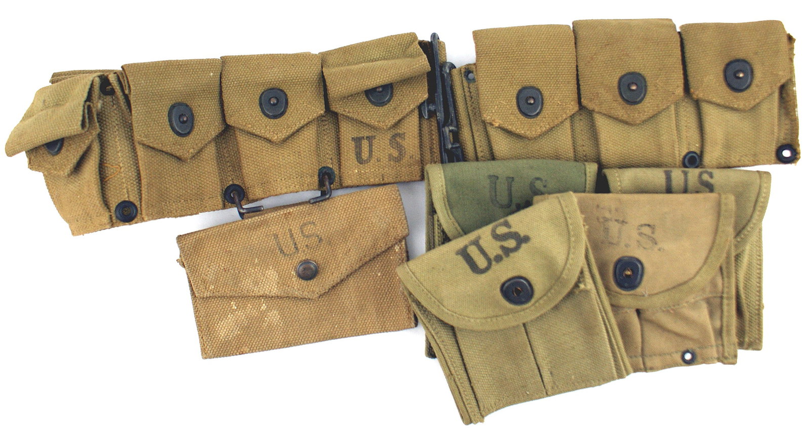 US M1923 30 cal dismounted cartridge belt: M-063 U.S. M1923 30 cal. Dismounted cartridge belt. Eight pockets (two were removed). Reverse marked "BURLINGTON MILLS INC. 1943". Medical pouch on brass hook. Marked "M E Co 1944. BRITISH MADE". Also