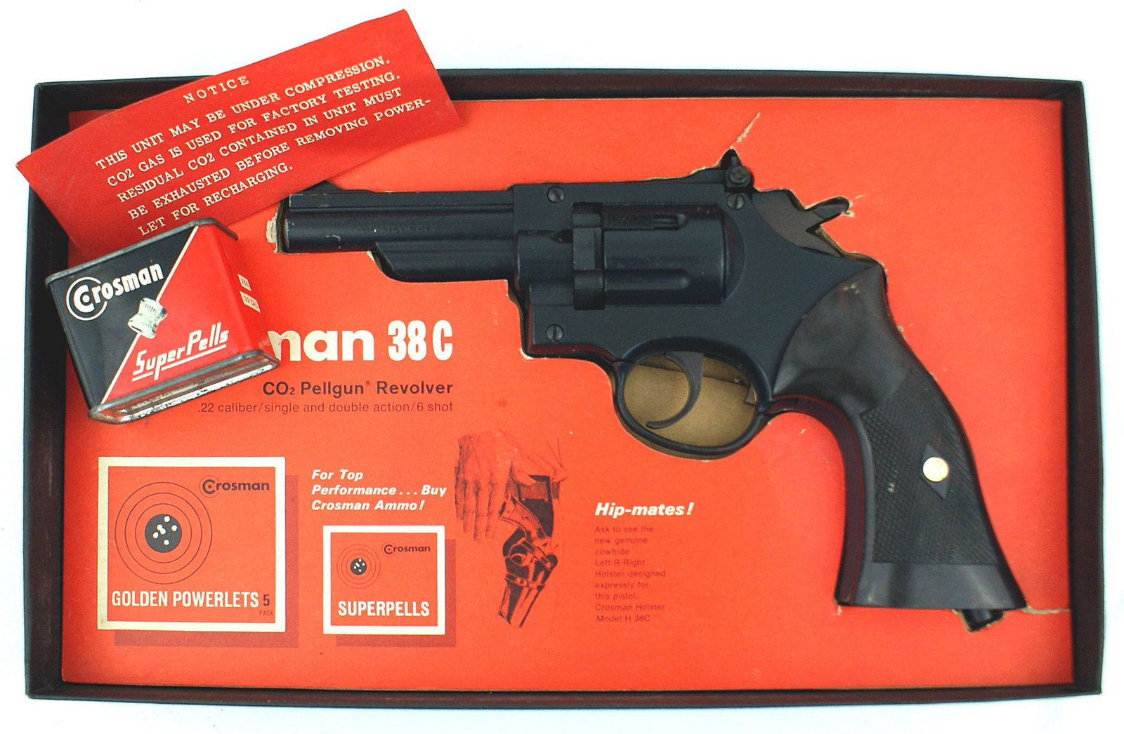 Crosman 38 COMBAT PELLGUN REVOLVER: M-076 Crosman "38 COMBAT PELLGUN REVOLVER". In original box (shows some age). Revolver in excellent condition. With a Crosman tin of "Super Pells." II+