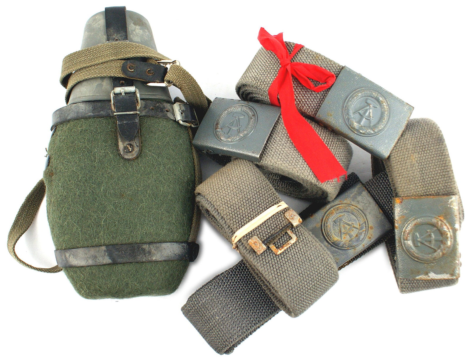 DDR East Germany Army field gear canteen belts: N-006 Lot of DDR (East Germany) Army field gear: (1) Canteen with a green felt cover, cup, harness and shoulder strap. Excellent. (2) Gray web belt and buckle. Blue - gray painted relief calipers/hamm