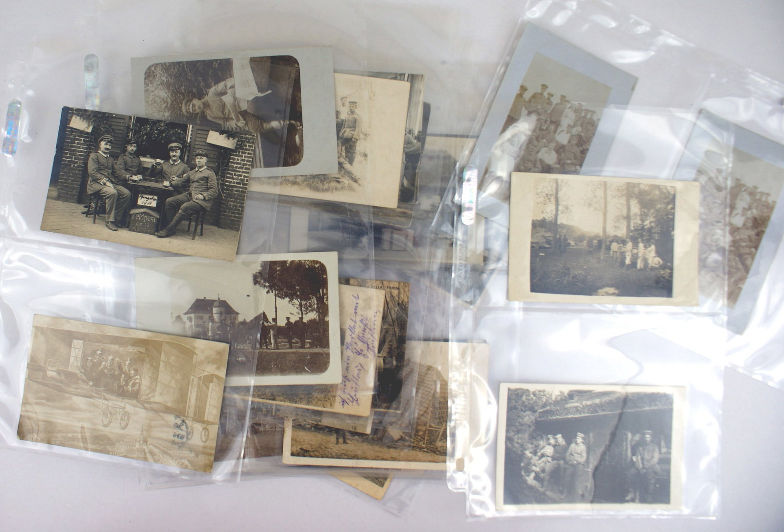 27 German WWI photo postcards and 6 photos: P-002 Lot of 27 German WWI photo-postcards and 6 photos. Includes: soldier's life, "R & R", field homes. Wounded/nurses, war damage, field kitchen, Infantry waiting for the train to go to the front, o