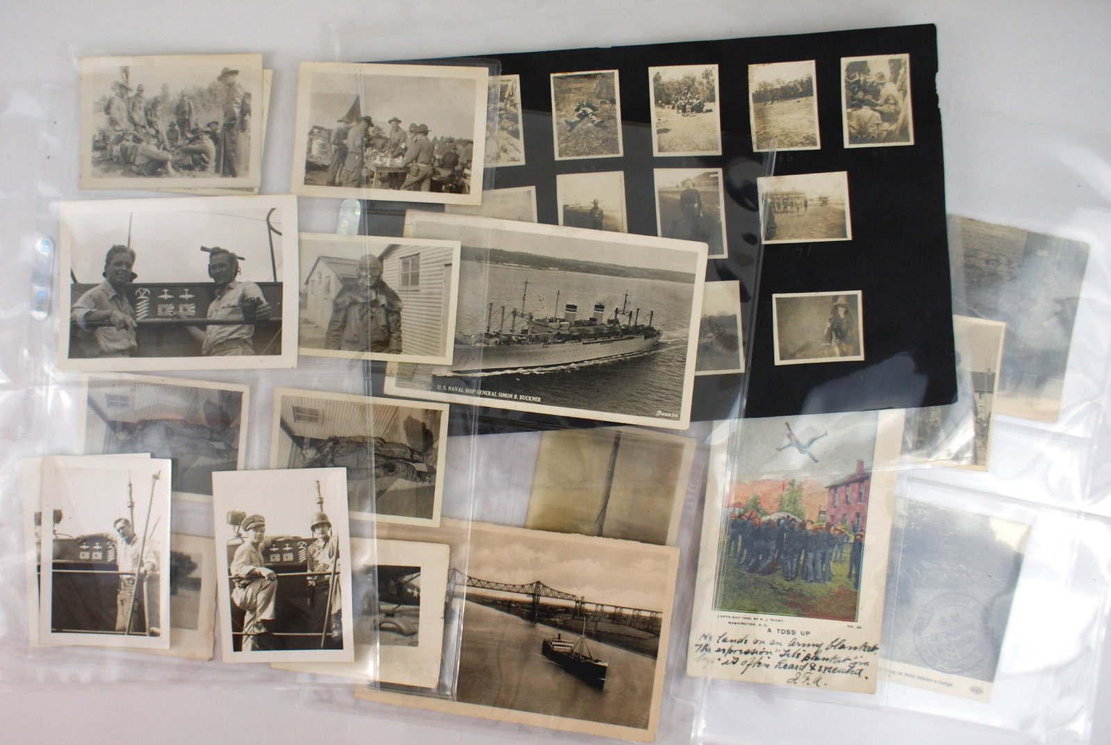 18 US etc WWI WWII photo postcards: P-009 Lot of 18 US. WWI/WWII, 13 Australian WWII and 3 miscellaneous photos and photo-postcards. Includes: (1) U.S. "304th Trench Mortar Battery - taken East of Vierely France August 10, 1918" - 3 pho