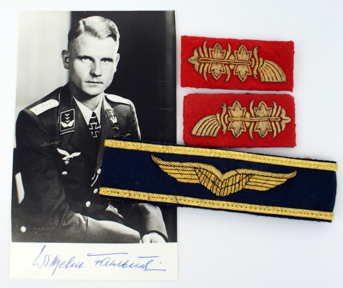Lot related to WWII German Luftwaffe officer Wilhelm Fahlbusch: Q-018 Lot related to WWII German Luftwaffe officer Wilhelm Fahlbusch who received a Knight's Cross of the Iron Cross on 31 - Dec. 1941 for anti-tank operations in Russia. Included are: (1) Ink signed 