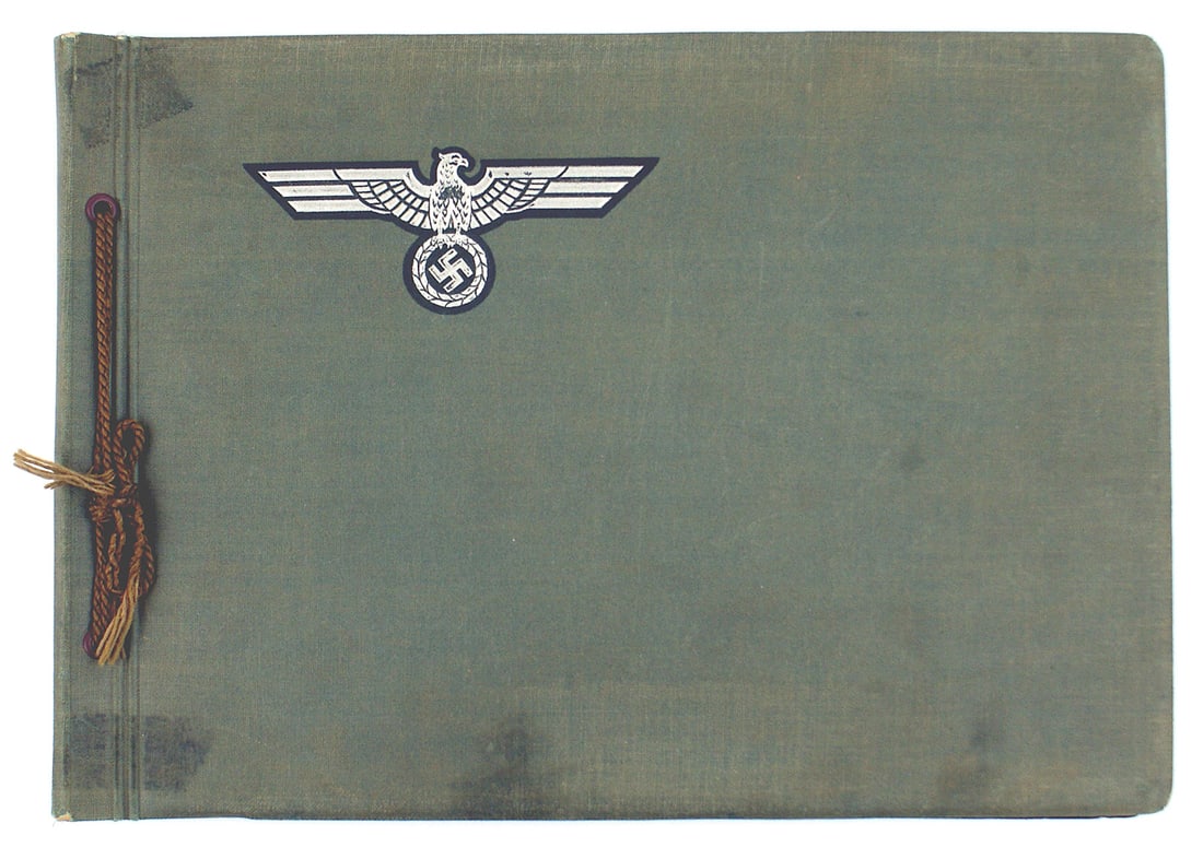 German pre WWII Army photo album: L-017 German WWII Army pre-war photo album. 7 1/2" x 10 1/4"green fabric cover with an relief embossed 3 3/4" x 1 1/2" eagle/swastika. Title page with "In remembrance of Army Service time in the Third