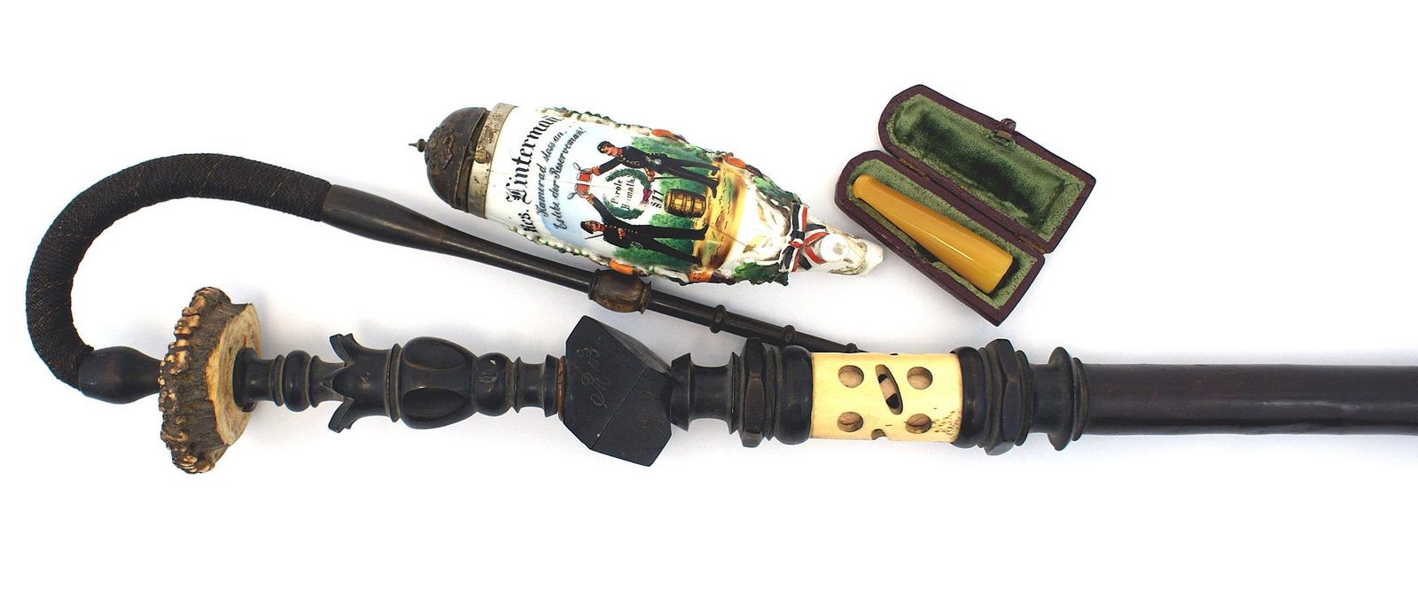 Imperial German Army regimental pipe: G-003 Imperial German Army regimental pipe. 5 1/2" porcelain bowl with a colorful scene of two soldiers within a relief open oak leaf/acorn wreath. Also, a roster of the 8th company, 40th Fus Regiment