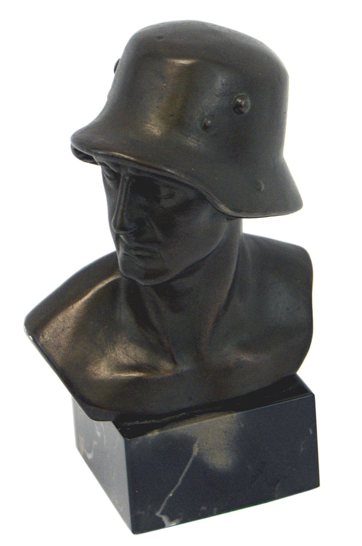 German WWII heroic bust WWI soldier: G-008 German Third-Reich heroic bronze bust of a helmeted WWI soldier. The subject is wearing an M1916 helmet which supports his serious facial expression. Signed by the artist "F. P. ZIMMER" Mounted 