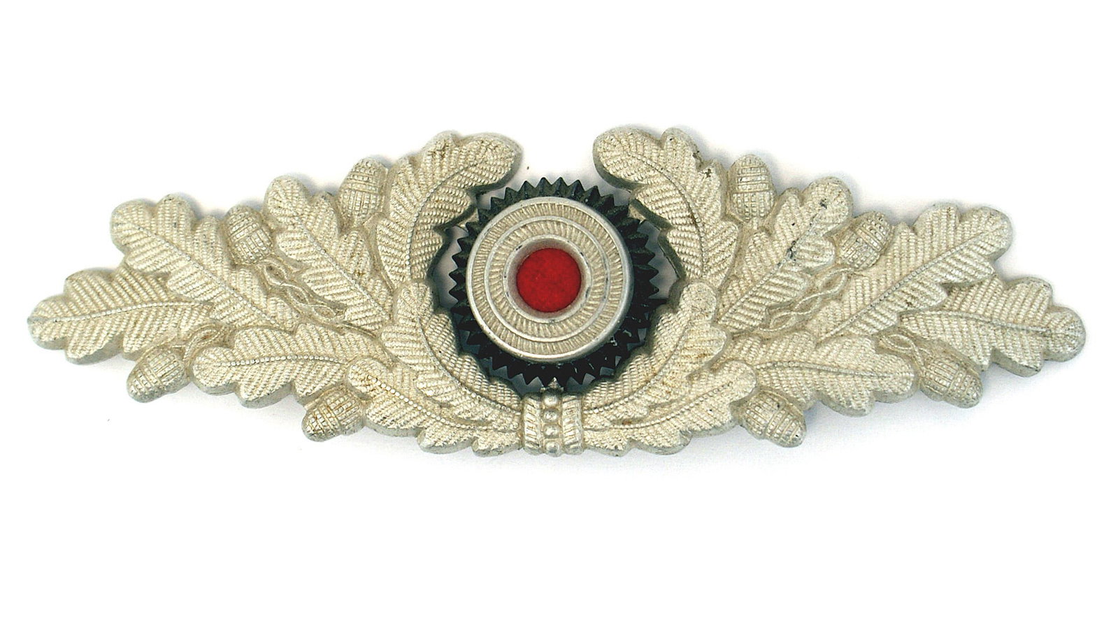 German WWII peaked cap insignia Forestry Red Cross: E-055 Lot of 2 Third-Reich peaked cap insignia. (1) Forestry Official. 4 5/8" spray of oak leaves wreath with a center rosette. (2) Red Cross. Round, closed ends, oak leaves wreath. Rosette in center.