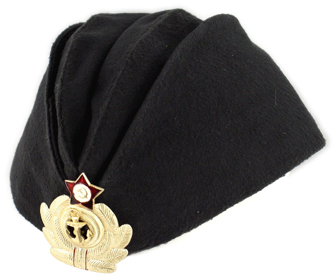 Russian Soviet Navy Pilotka overseas cap: E-088 Russian Soviet Cold War Era Navy "Pilotka" (o'seas cap). Black rayon, leather sweatband and blue lining. Submarine badge pinned to front of cap. II