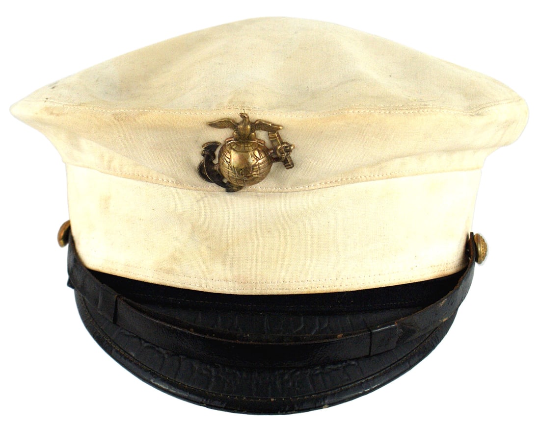 USMC M1912 white top rain cover peaked cap: E-094 U.S.M.C. M1912 white top/rain cover peaked cap. Correct EGA Badge with latitude and longitude lines. Black leather chinstrap and leather brim with natural "alligator" lines. Old style eagle/anch