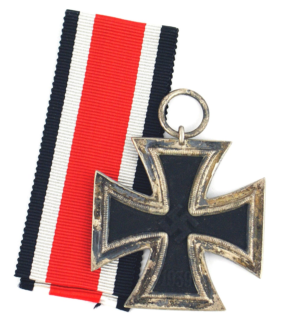 German WWII 1939 Iron Cross 2nd Class: B-049 German WWII 1939 Iron Cross 2nd Class. Relief "1939" on obverse and "1813" on reverse. Black center cross is magnetic Silver frame was not cleaned. Ring appears to be stamped "21" but was stampe