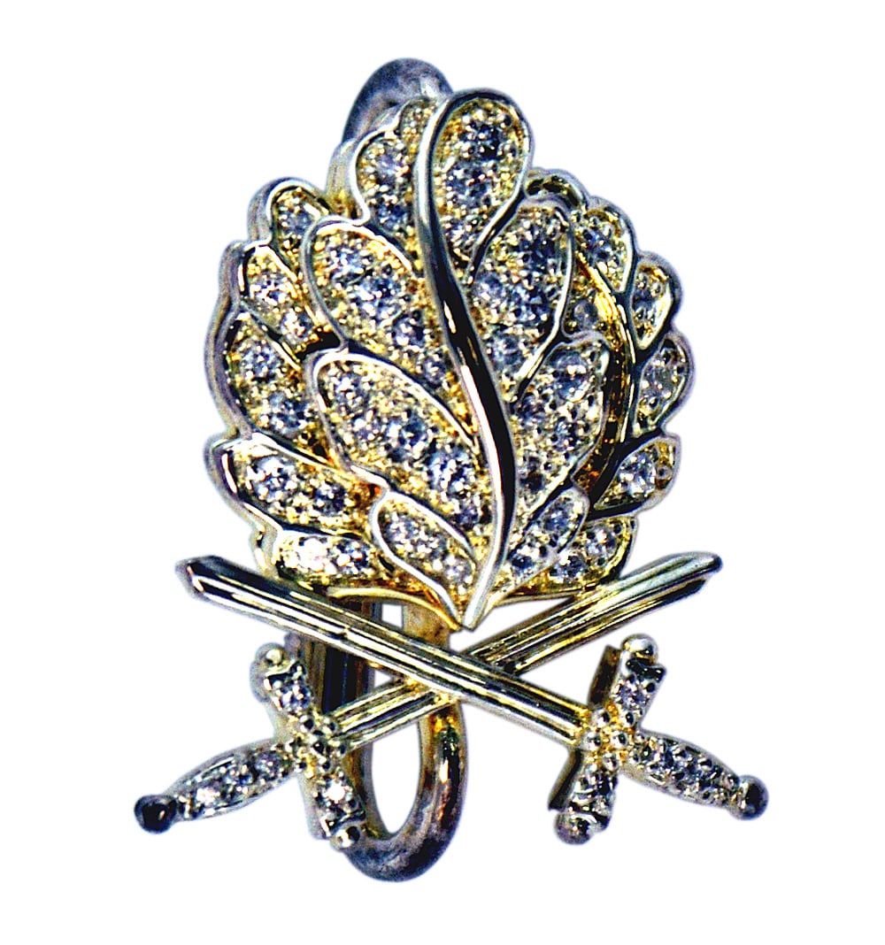 German 1957 Oak Leaves Swords Brilliants: B-113 German 1957 Oak Leaves, Swords and Brilliants. Made for the WWII Knight's cross recipients who lost or never received this higher award. Silver leaves and Swords appear gilt. Wire loop is marked