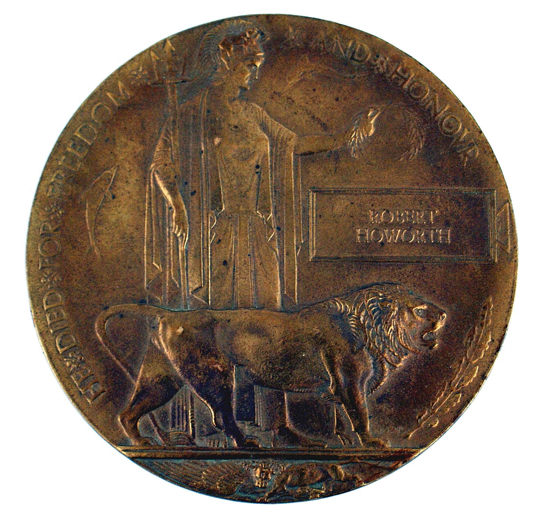 Great Britain WWI Death Penny: B-126 Great Britain WWI "Death Penny" bronze plaque 4 3/4" diameter with an allegorical figure holding a laurel wreath over the name of the KIA, "ROBERT HOWORTH" and a standing lion. The perimeter has