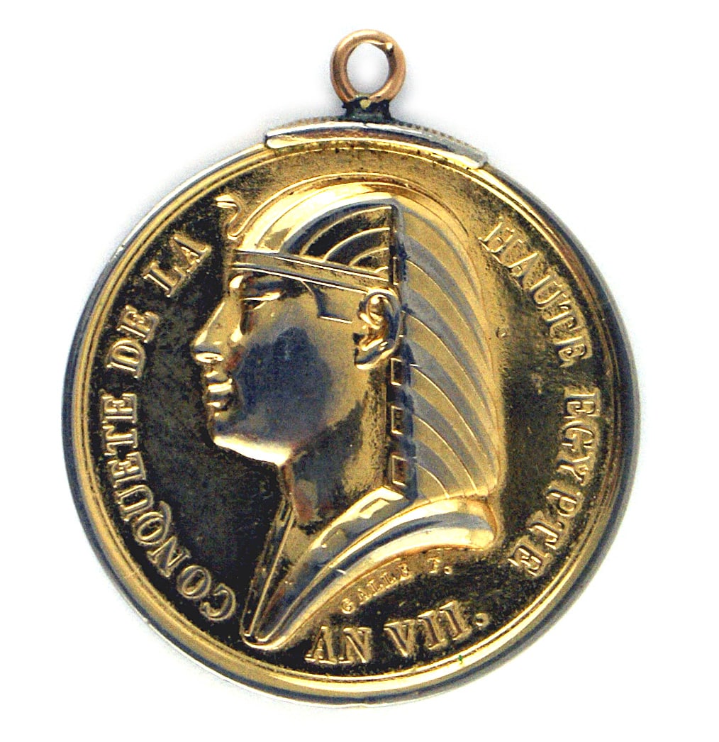 French Napoleonic medal 1799 Conquest of Egypt: B-130 French Napoleonic medal commemorating the "1799 Conquest of Upper Egypt". Designed by Andre Galle and struck by the Paris Mint, the 35mm gold washed silver medal is marked "AN VII" and bears the
