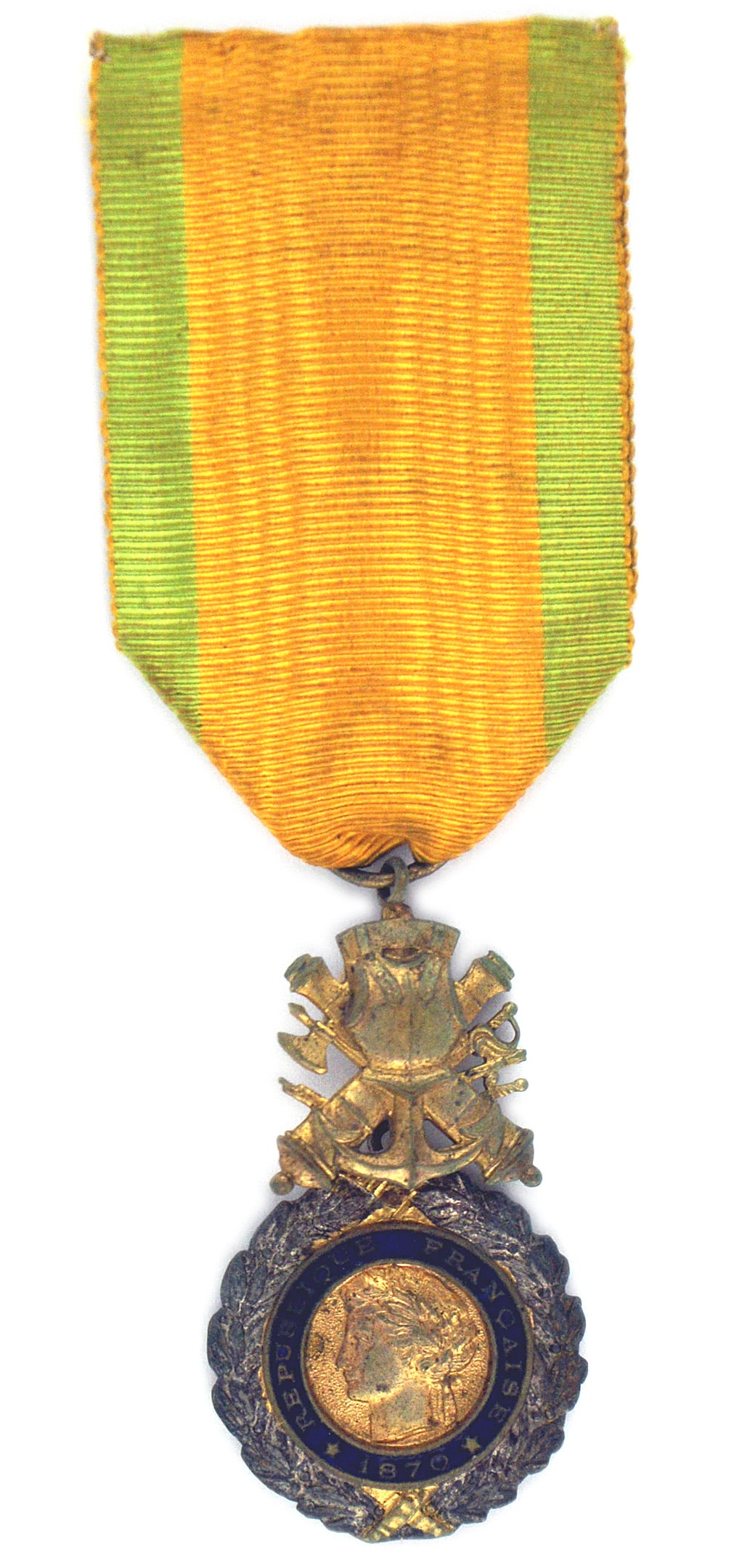 France Military Medal 1870 Valor: B-132 France. Military Medal 1870. Circular silver gilt laurel wreath. Gilt center medallion is a side profile of a classic female head within a blue enamel band with "1870 REPUBLIC OF FRANCE". Revers