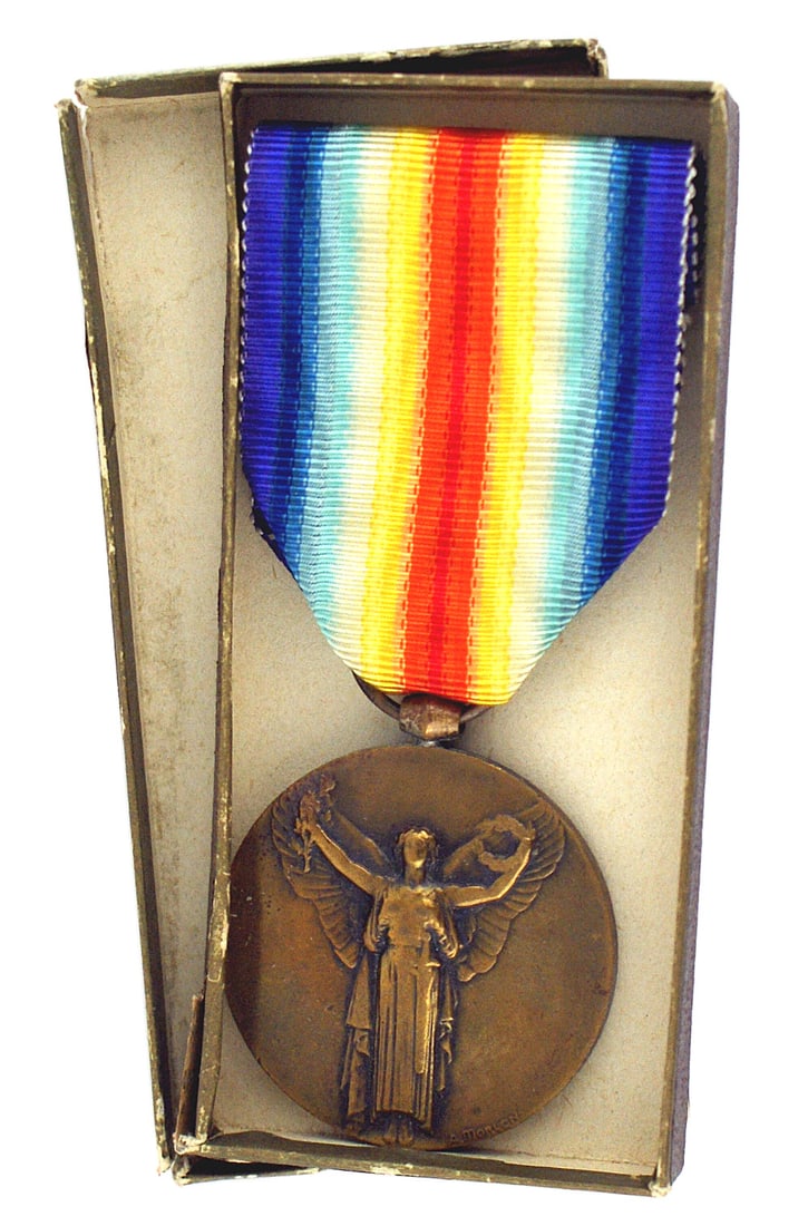 France World War I WWI Victory Medal: B-134 France. World War I Victory Medal. Bronze with a winged allegorical figure holding an oak leaf branch and a laurel wreath. Reverse "RF THE GRAND ARMY FOR THE CIVILISATION 1914 - 1918" With origi