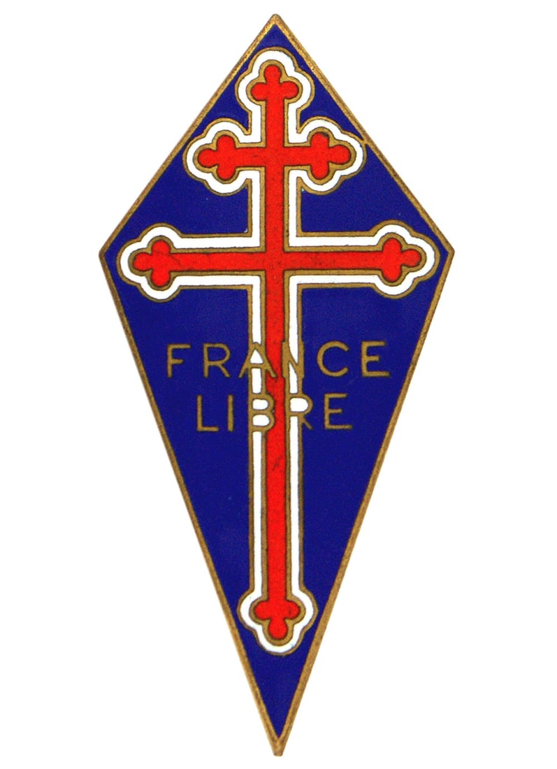 Free French WWII badge: B-138 "Free French" WWII badge. 2 5/8" diamond shaped blue enameled badge bearing a red Cross of Lorraine and "FRANCE LIBRE". Pin back. Well made. II
