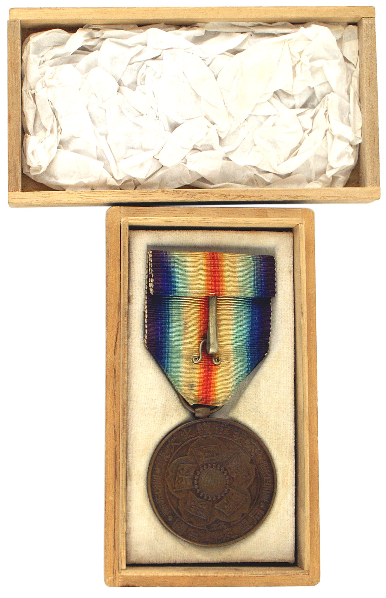 Japan WWI Victory Medal: B-149 Japan WWI Victory Medal. Obverse bears a relief ancient god, "Take - Mikazuchi - no - kami" holding a weapon. Reverse has a cherry blossom holding the Japanese flag and flags of Allies. With a p