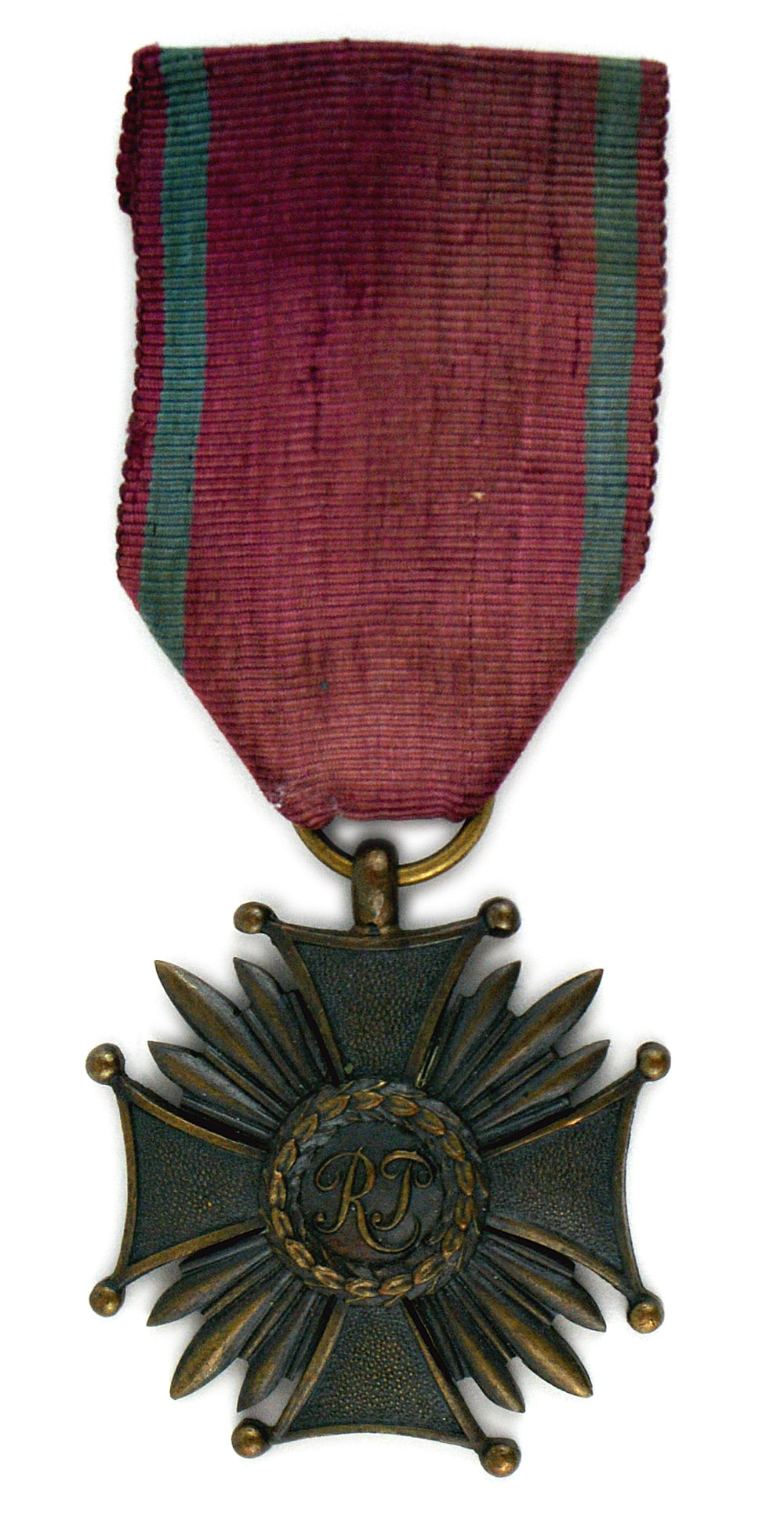 Poland Cross of Merit Bronze 3rd Class: B-177 Poland. Cross of Merit. Bronze - 3rd Class. Rays between arms of cross. Oak leaf wreath around "RP" in center. With original ribbon. II