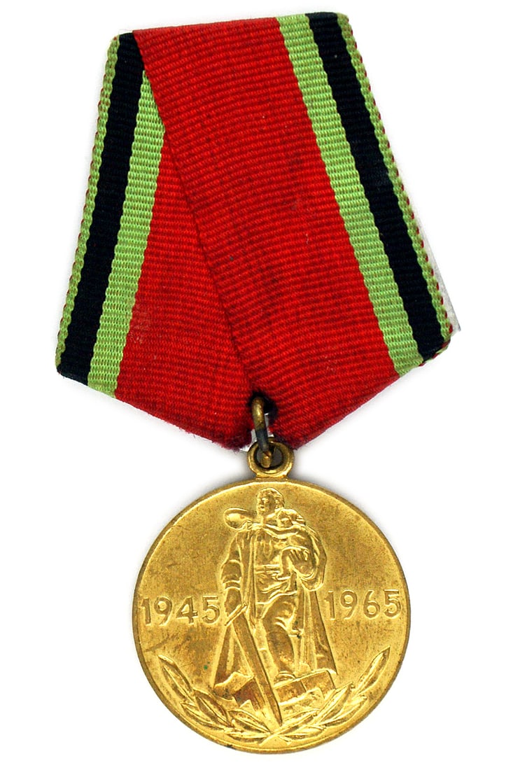 Russia 20TH ANNIVERSARY OF WWII Medal: B-222 Soviet Russia "TWENTIETH ANNIVERSARY OF WWII" Medal. Gilt. Obverse: warrior holding a broad sword and a child with "1945-1965". Reverse: Roman numeral "XX" and states "TWENTY YEARS SINCE VICTORY